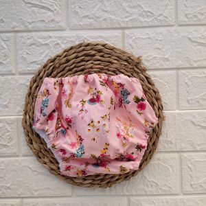Cubrepañal rosa con flores